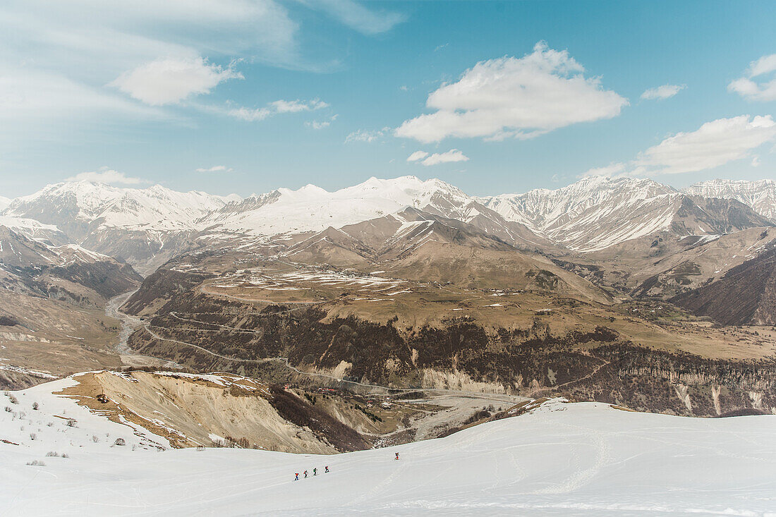 A group of skiers making a ski tour in the mountains, Gudauri, Mtskheta-Mtianeti, Georgia