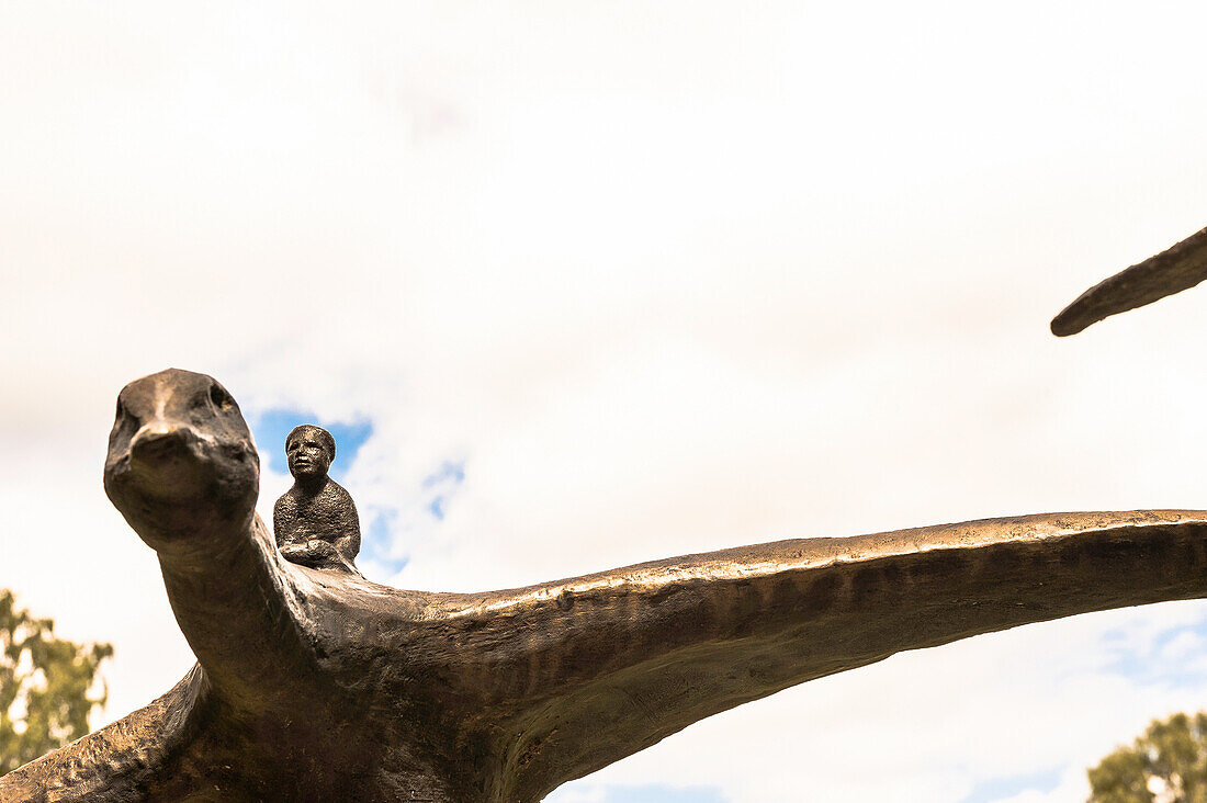 sculpture of the small Nils Holgersson riding a goose in Rottneros sculpture park, Varmland, Sweden