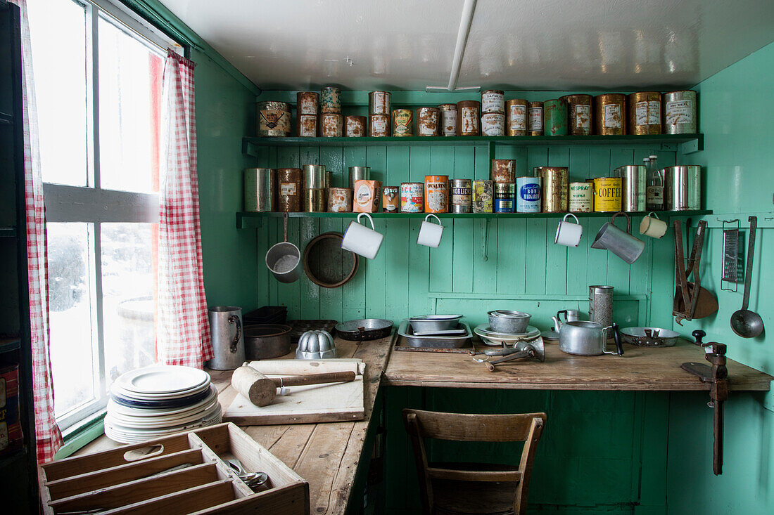 Historic cans and kitchen utensils on display at the museum of Port Lockroy British Antarctic Survey Station Port Lockroy, Wiencke Island, Graham Land, Antarctic Peninsula, Antarctica