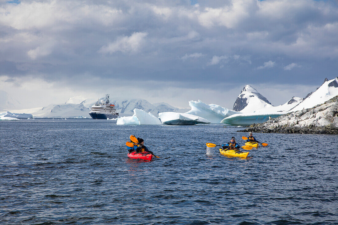 Sea kayak excursion for passengers of expedition cruise ship MV Sea Spirit (Poseidon Expeditions) Cuverville Island, Graham Land, Antarctic Peninsula, Antarctica