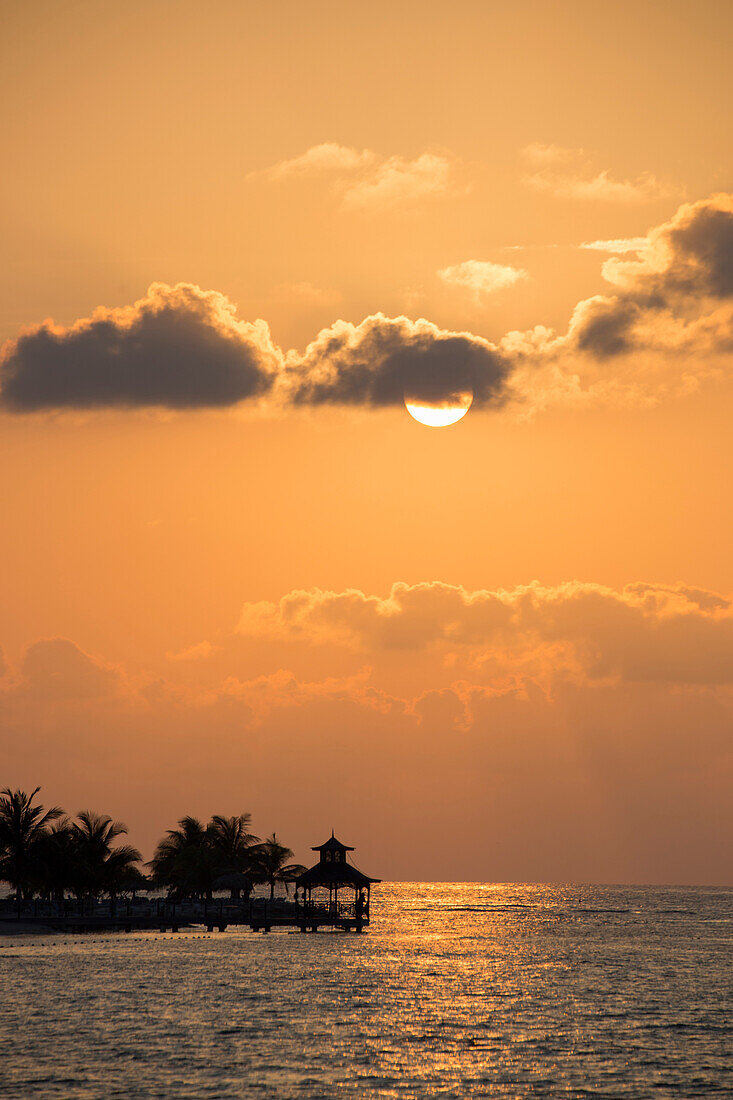 Silhouette of pavillion on jetty Rose Hall, near Montego Bay, Saint James, Jamaica