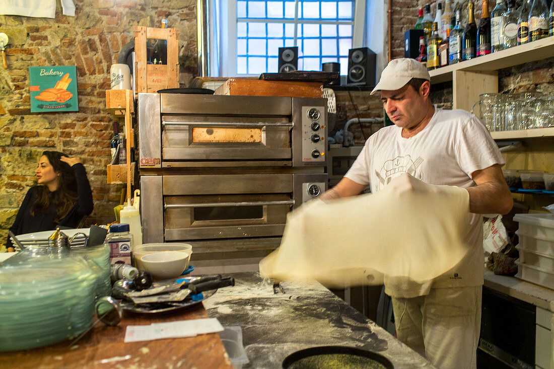 pastry for focaccia being made in restaurant Tortuga, Genoa, Genoa, Liguria, Italy