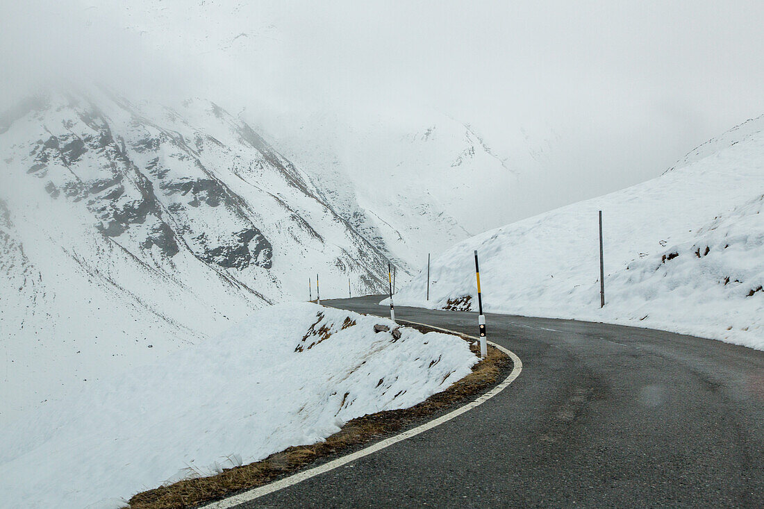 Stelvio Pass in autumn, early snow, empty road, mountain Pass, Alps, Italy