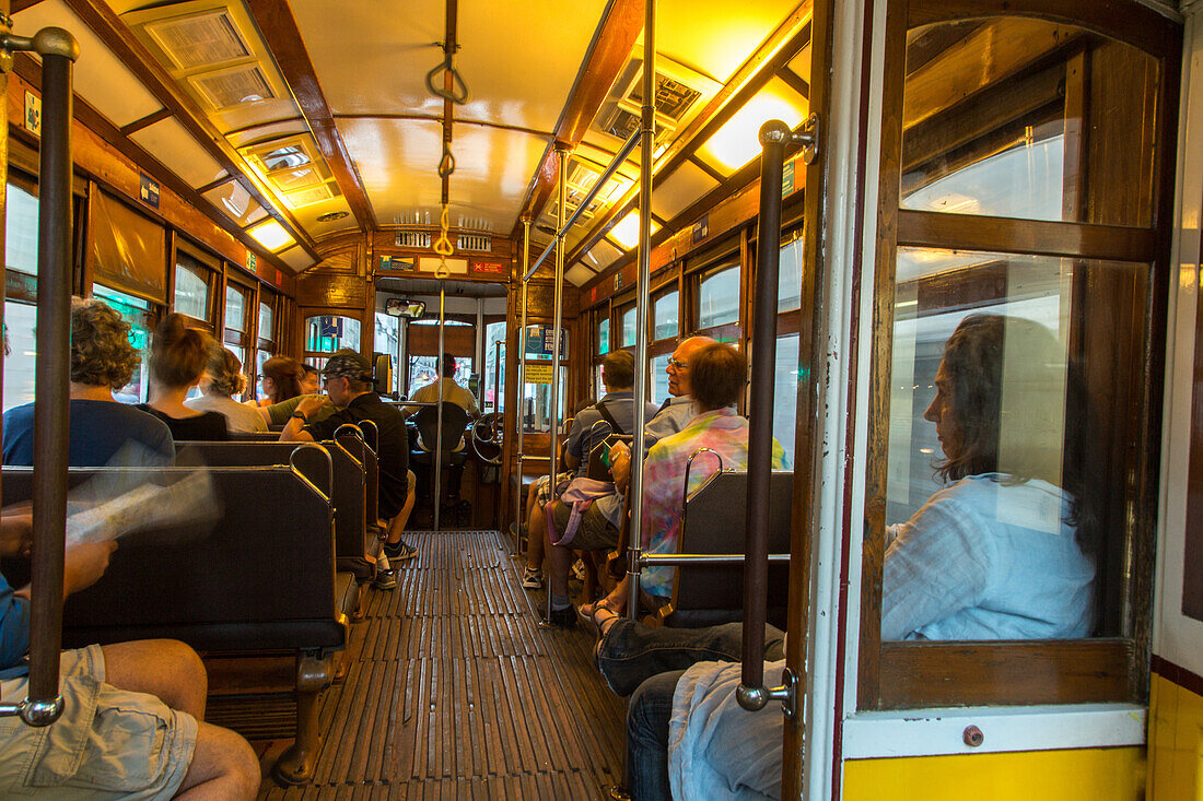 interior of tram, passengers, Lisbon, Portugal