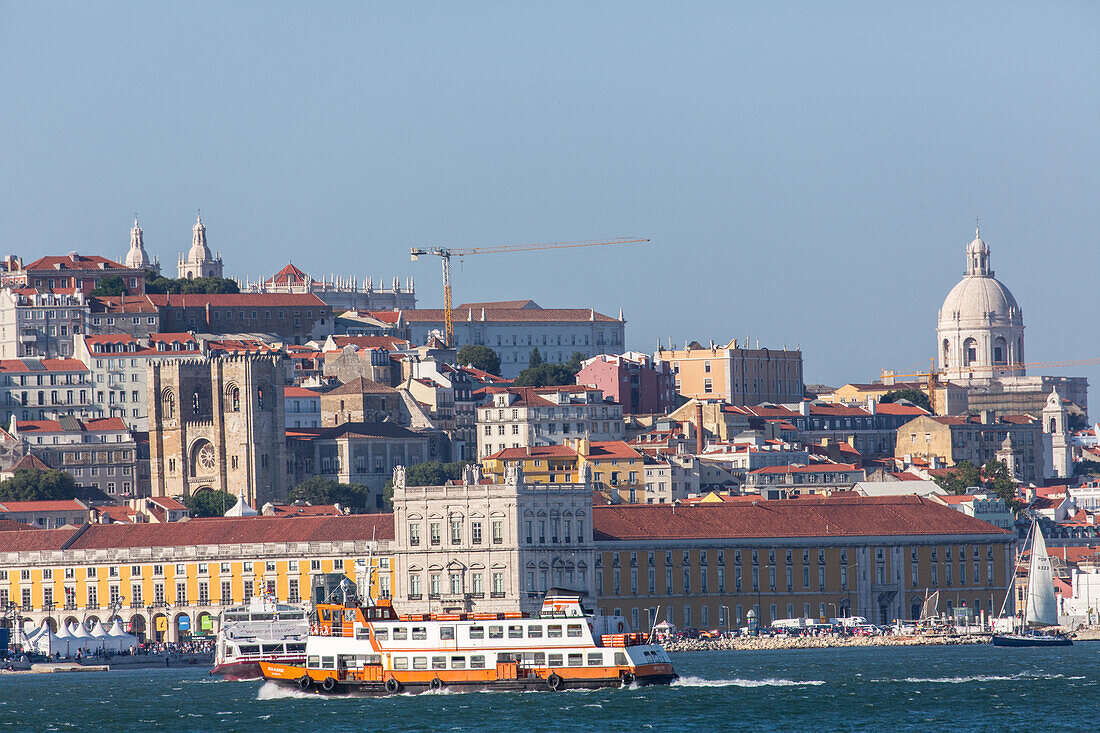 view across city to hilltop with Sao Jorge Castle, Lisbon, Portugal