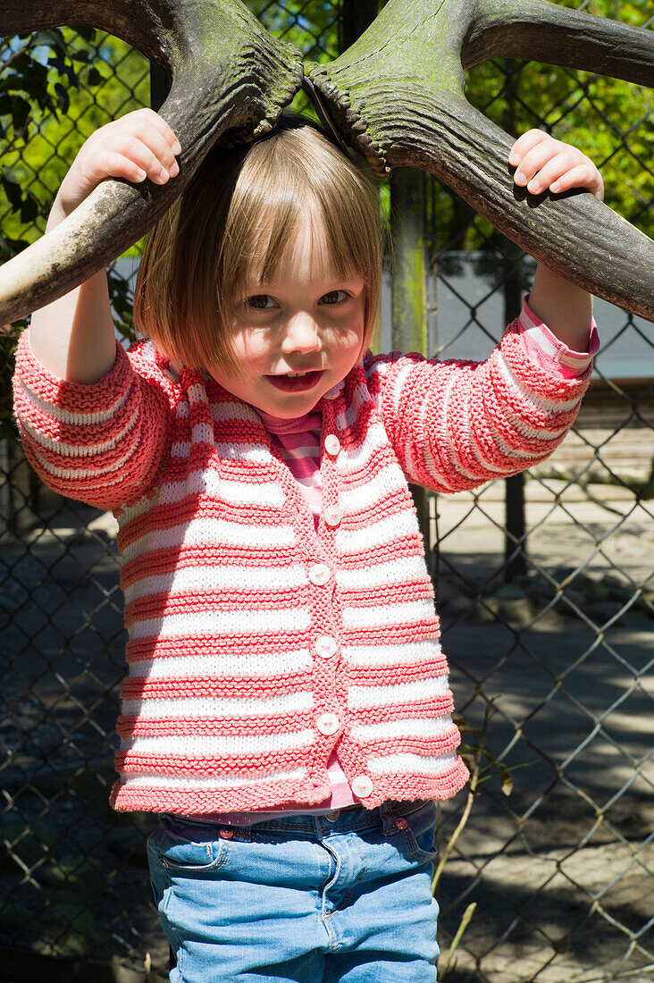 Girl in zoo, Zoo Hagenbeck, Hamburg, Germany