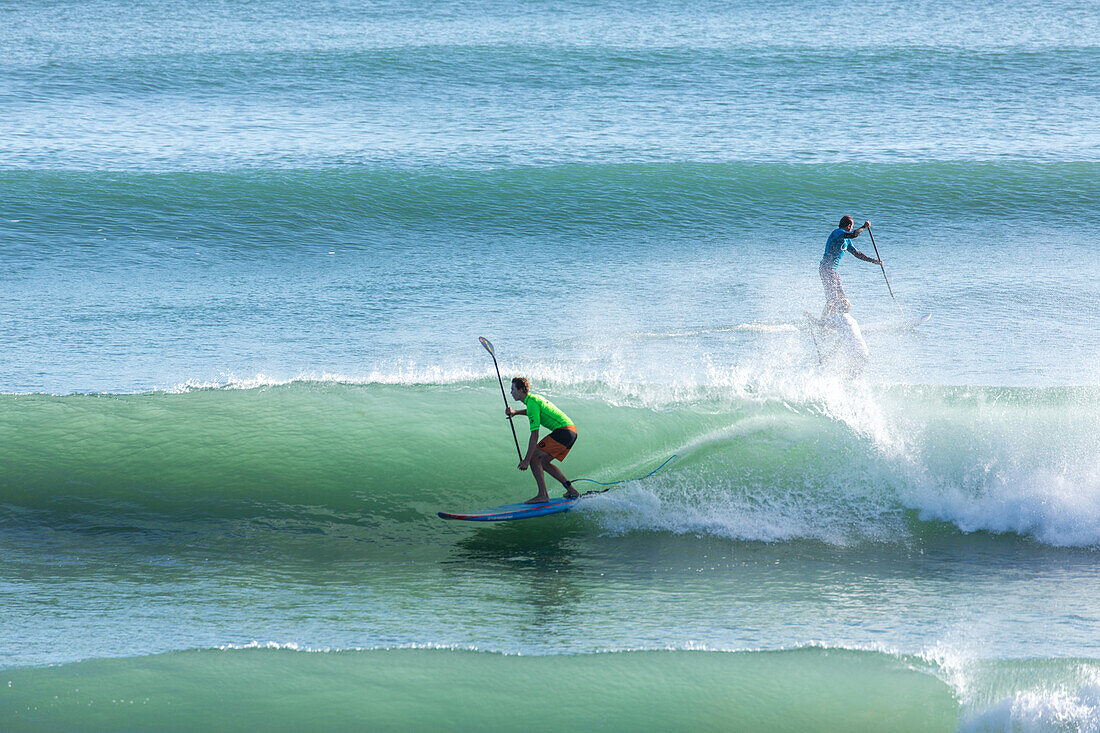 stand up paddle surfer, SUP, standup paddleboarding, water sport, Papamoa Beach, holiday beach, surf beach, Tauranga, North Island, New Zealand