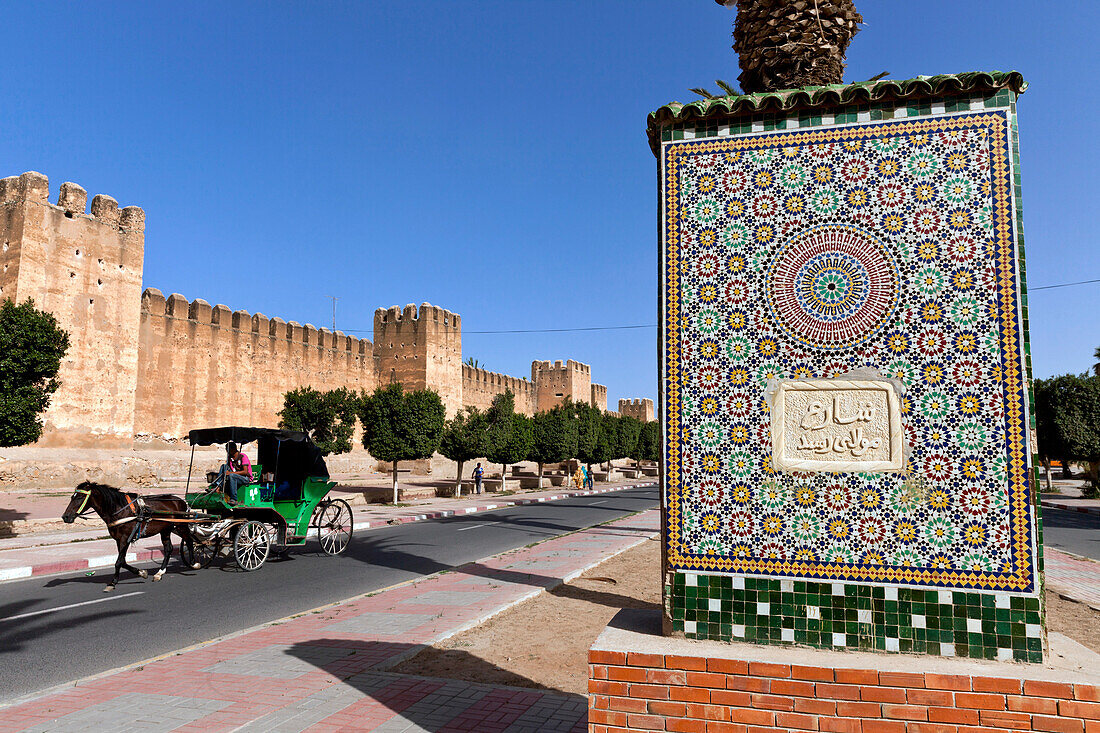 Old city wall and ramparts and ceramic welcoming sign, Taroudant, Morocco