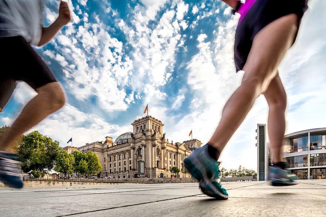 Jogger in front of Reichstag, Berlin, Germany