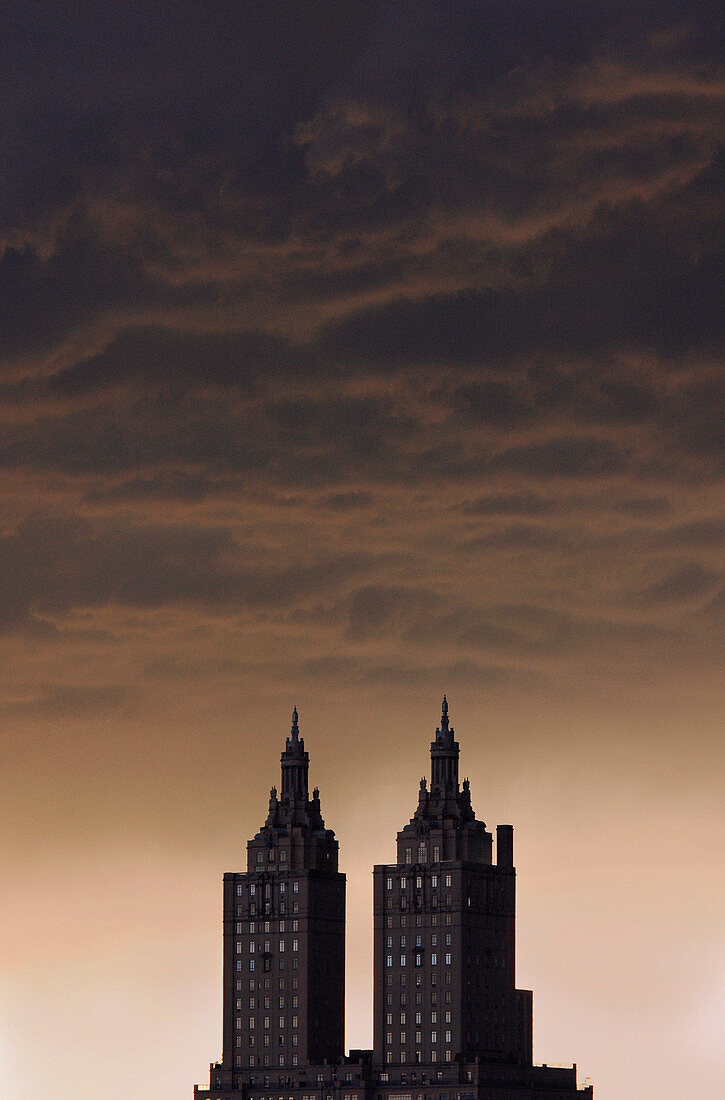 Twin-Towered Apartment Building at Sunset, New York City, New York, USA