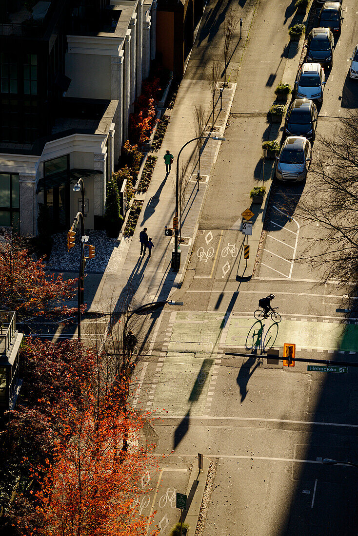 High angle view of bicyclist in city intersection