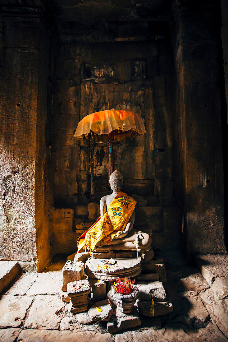 Offerings at shrine in Angkor Wat, Siem Reap, Cambodia