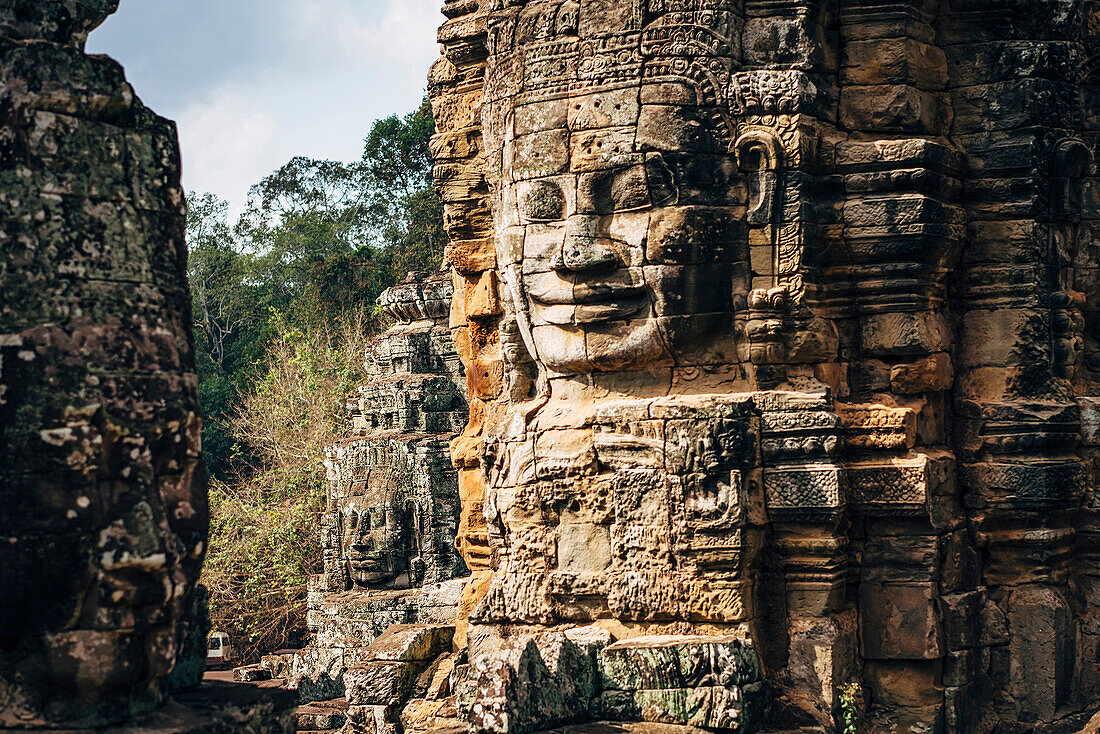 Dilapidated statue and pillar at Angkor Wat, Siem Reap, Cambodia