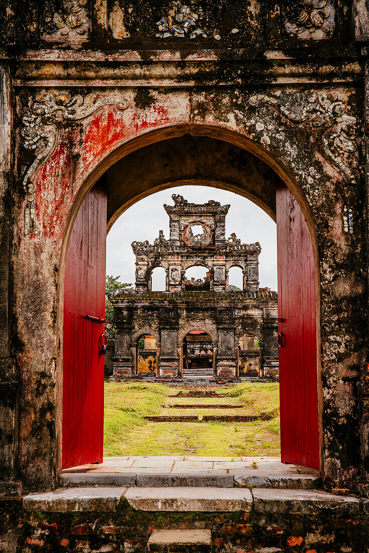 Ornate archway in dilapidated ruins