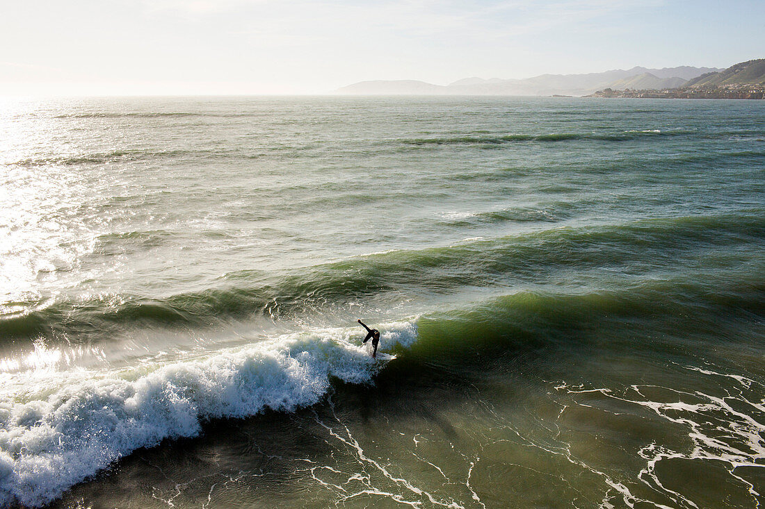 High angle view of surfer in ocean waves