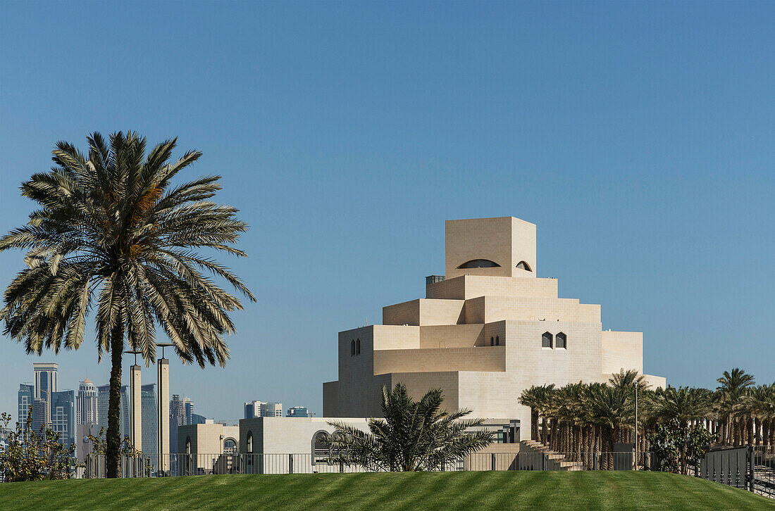 Doha Museum of Islamic Art under blue sky, Doha, Qatar