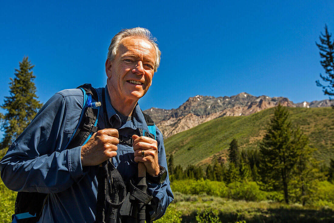 Caucasian man hiking in mountains