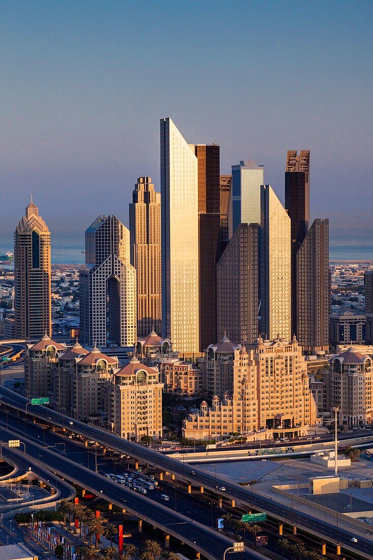 UAE, Dubai, Downtown Dubai, elevated view of skyscrapers on Sheikh Zayed Road from downtown, dawn.