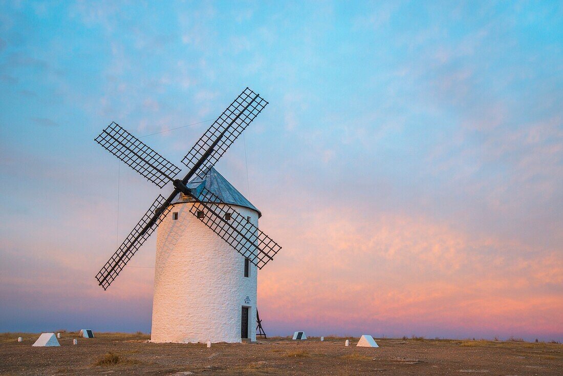 Windmill at dusk. Campo de Criptana, Ciudad Real province, Castilla La Mancha, Spain.