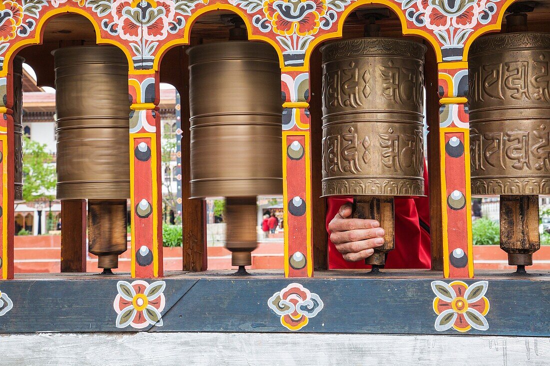 Prayer wheels are used by Buddhists to accumulate wisdom and merit and to purify negativities. Thimphu Bhutan.