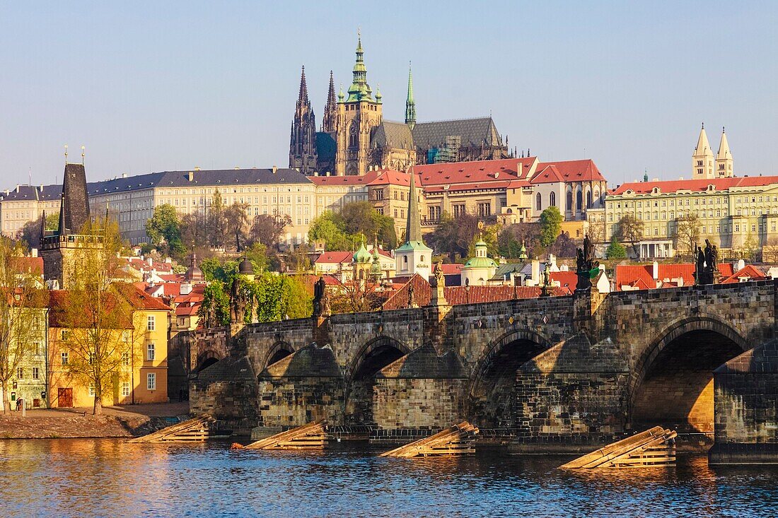 Charles Bridge, Castle and St Vitus Cathedral at dawn. Prague, Czech Republic.