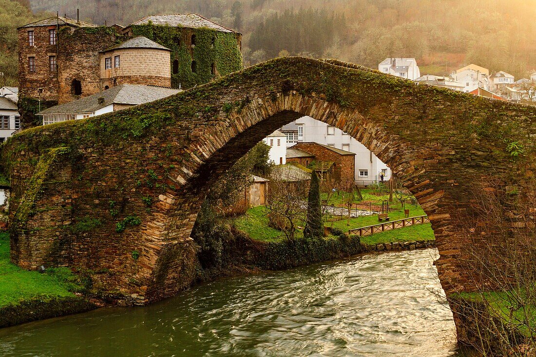 Medieval bridge and castle of Navia de Suarna (Ancares). Ancares is a biosphere reserve, located in the province of Lugo, Galicia, Spain.