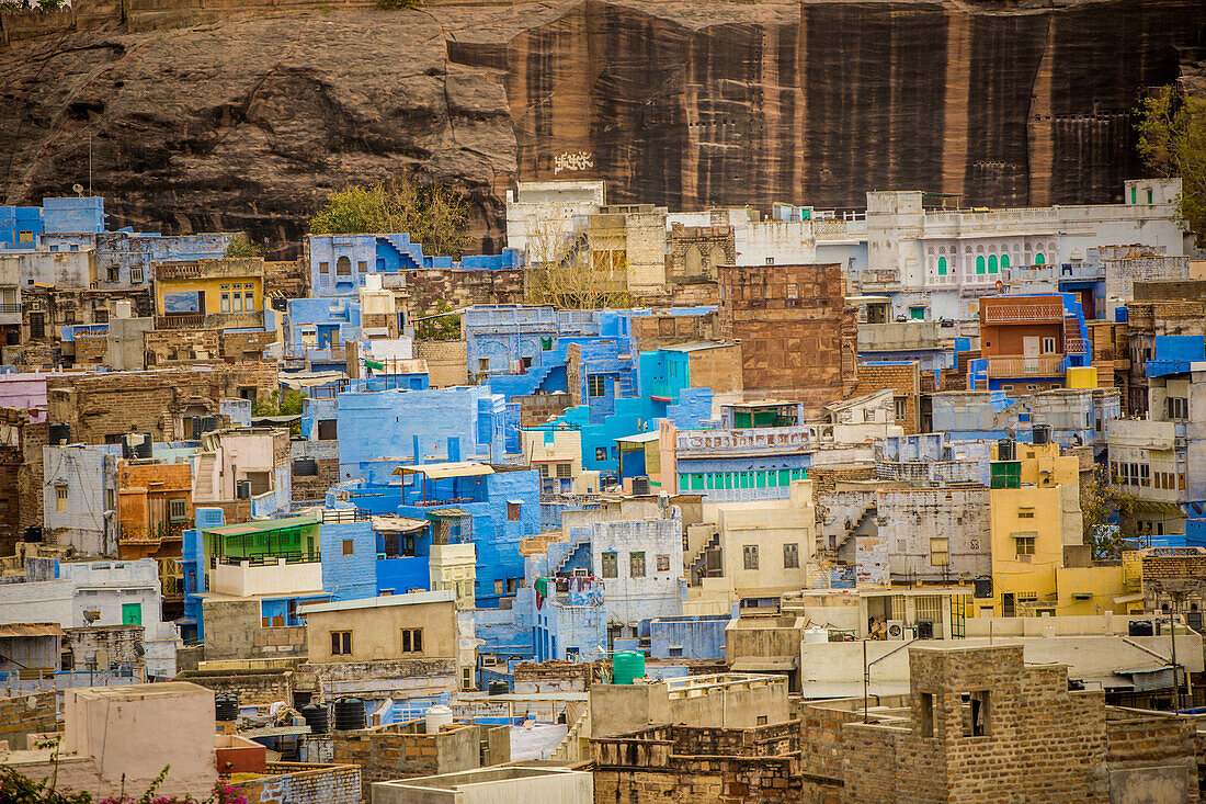 Mehrangarh Fort towering over the blue rooftops in Jodhpur, the Blue City, Rajasthan, India, Asia