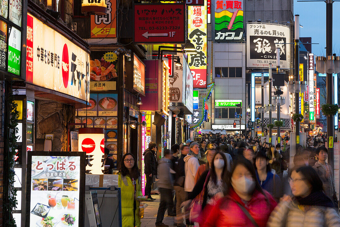 A crowded street at night in the Ginza district of Tokyo, Japan, Asia