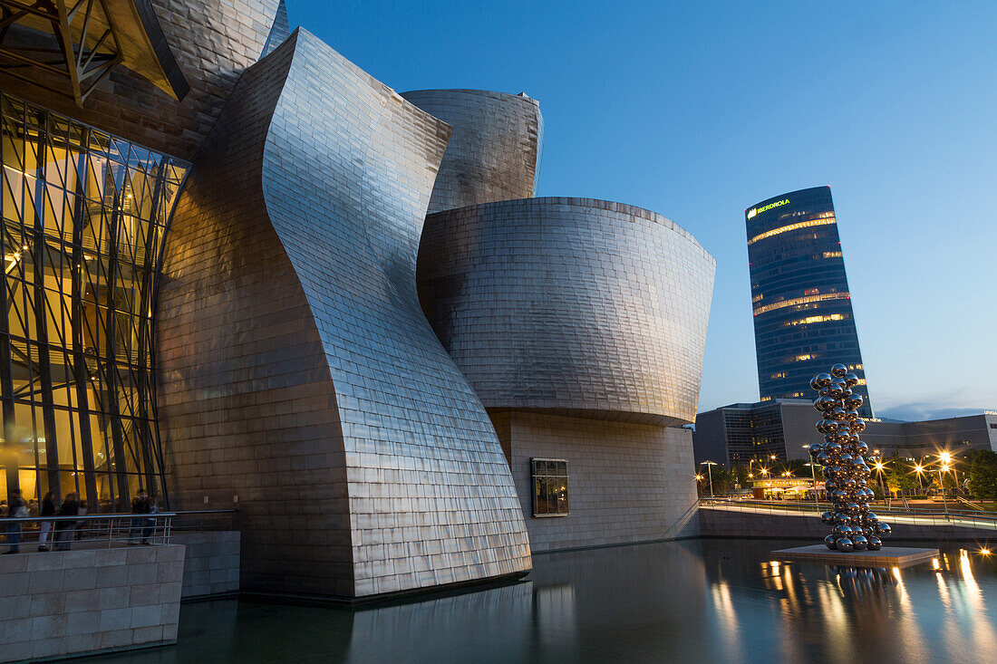 The Guggenheim Museum and Iberdrola Tower in Bilbao, Biscay (Vizcaya), Basque Country (Euskadi), Spain, Europe
