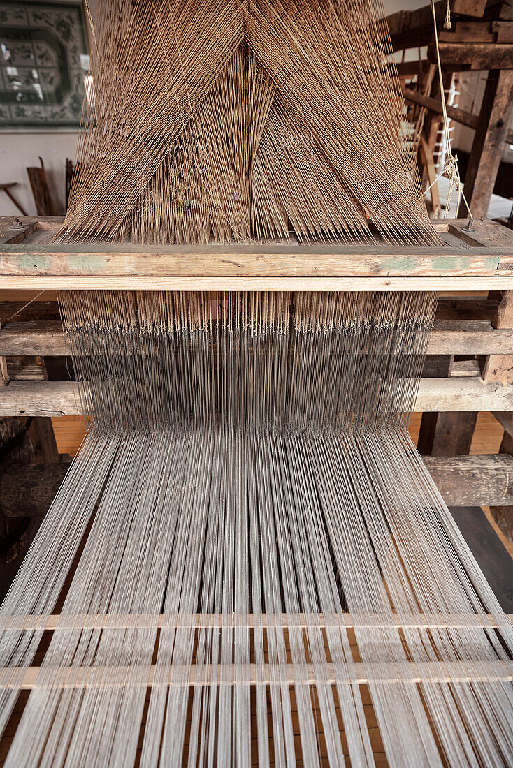 historical industrial weaving loom, textile museum at Laichingen, Swabian Alb, Baden-Wuerttemberg, Germany
