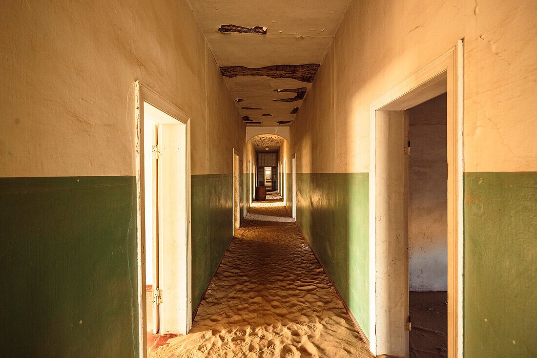 The morning sun in the hospital of ghost town of Kolmanskop, former Diamond mining town, Karas, Namibia