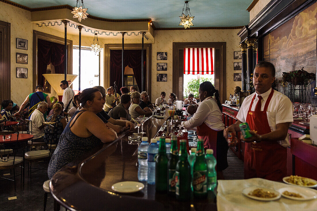 The restaurant El Floridta with the statue of writer Ernest Hemingway, La Havana Vieja, Havana, Cuba