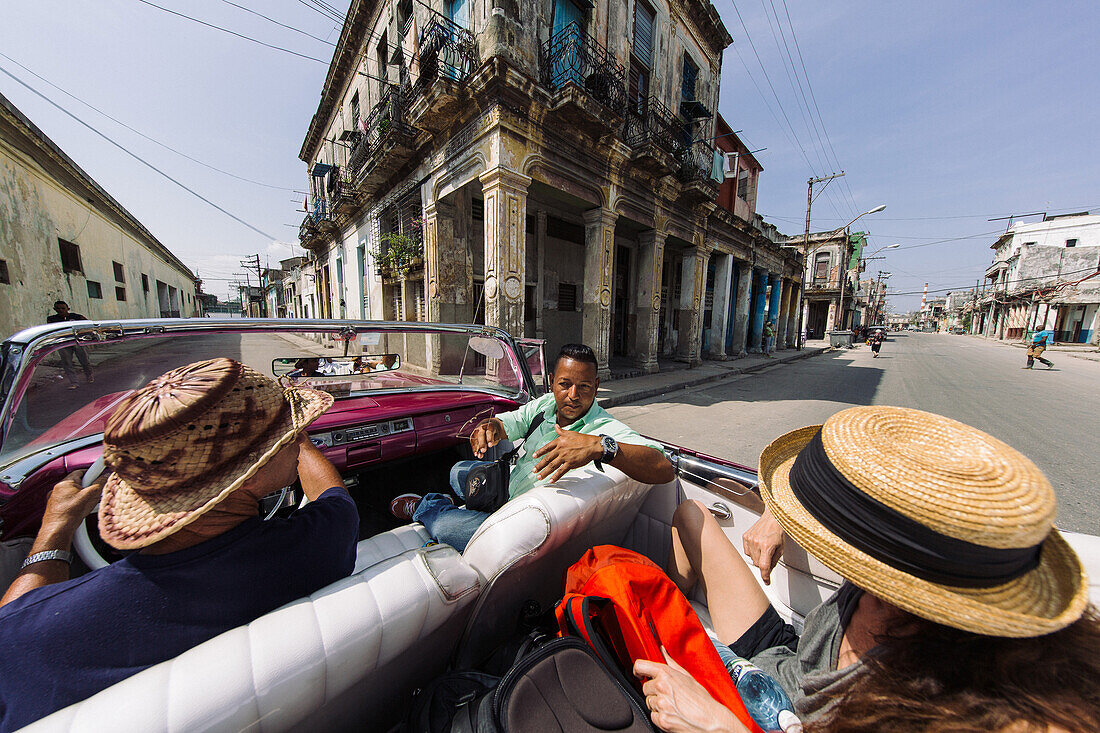With an old Ford Caprio through La Havana Vieja, Havana, Cuba