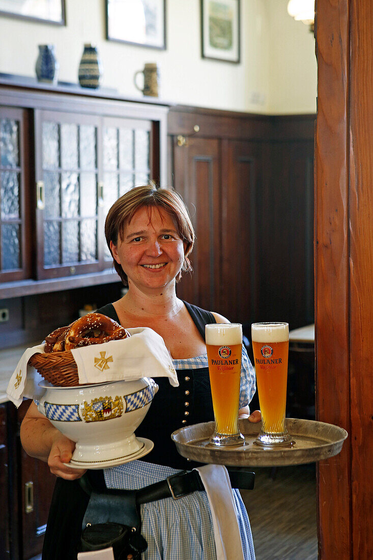 Waitress serving traditional white sausages and wheat beer in restaurant Grossmarkthalle, Sendling, Munich, Upper Bavaria, Bavaria, Germany