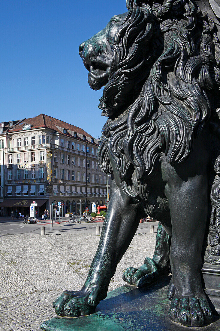 Lion at the base of Max-Joseph I. memorial, Max-Joseph-Platz, Munich, Upper Bavaria, Bavaria, Germany