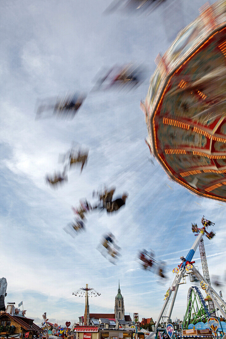 Chairoplane at the Oktoberfest, Church of St. Paul in the background, Oktoberfest, Munich, Upper Bavaria, Bavaria, Germany