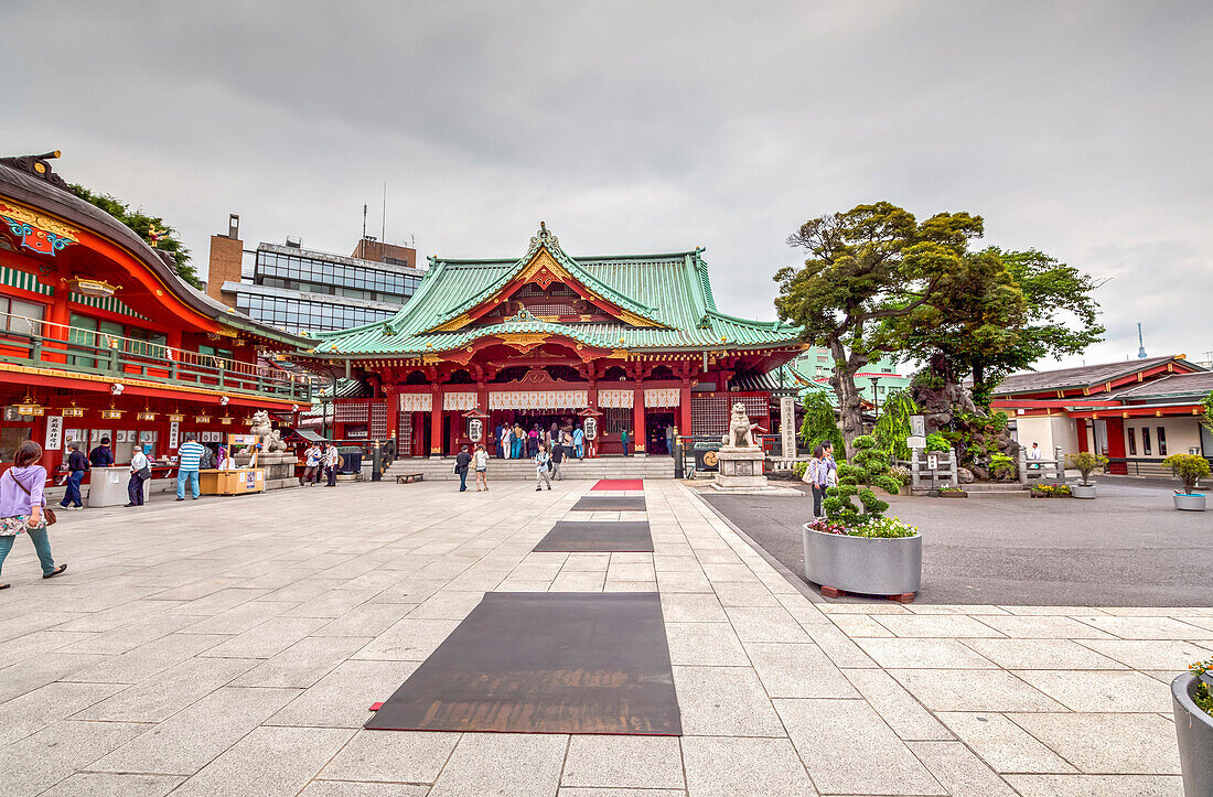 Kanda-Myojin Shrine with visitors and cloudy sky in Kanda, Chiyoda-ku, Tokyo, Japan