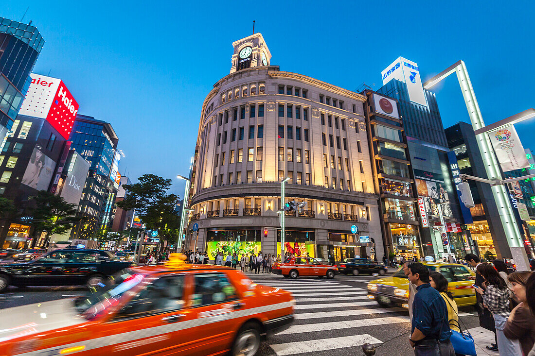 Crossing with taxis at Wako Building in Ginza, Chuo-ku, Tokyo, Japan