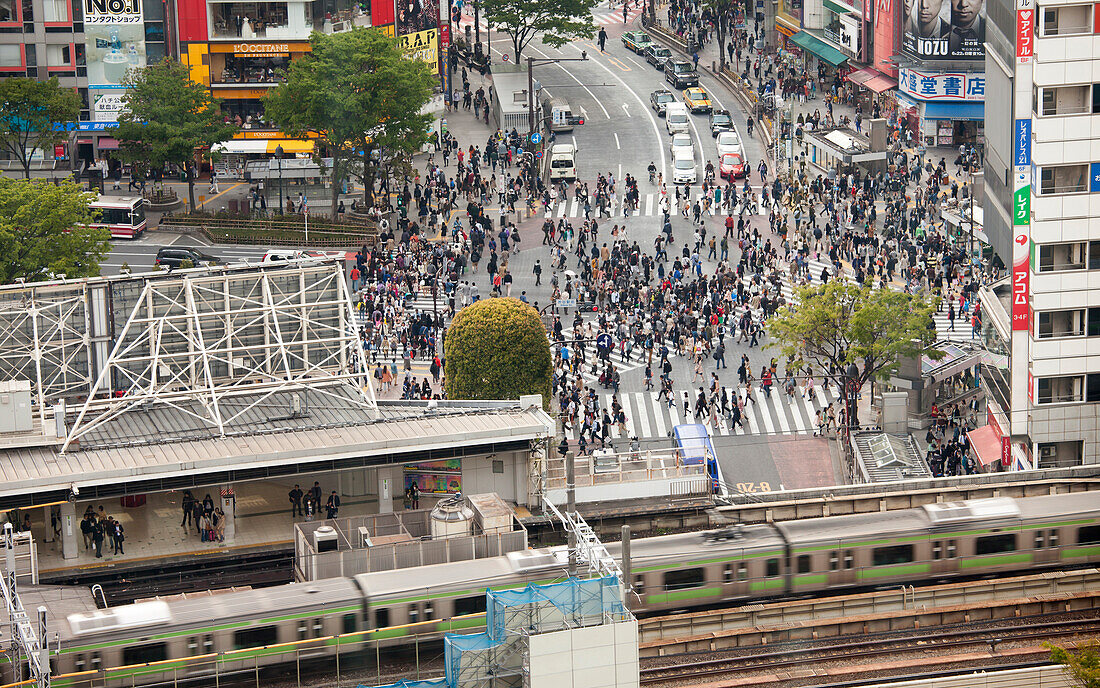 Shibuya Station and famous pedestrian zebra crossing in Shibuya from above, Tokyo, Japan
