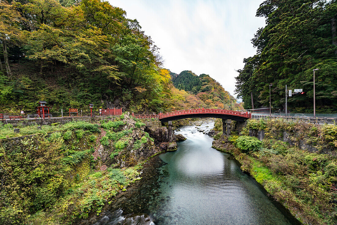 Wooden red bridge named Shinkyo over river Daiya in Nikko, Tochigi Prefecture, Japan