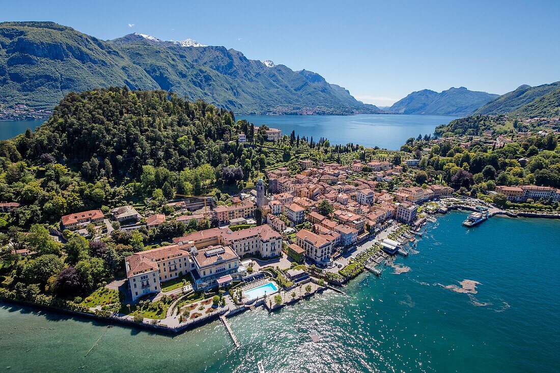 Aerial view of the turquoise waters of Lake Como and green headland that frames the village of Bellagio Italy Europe.