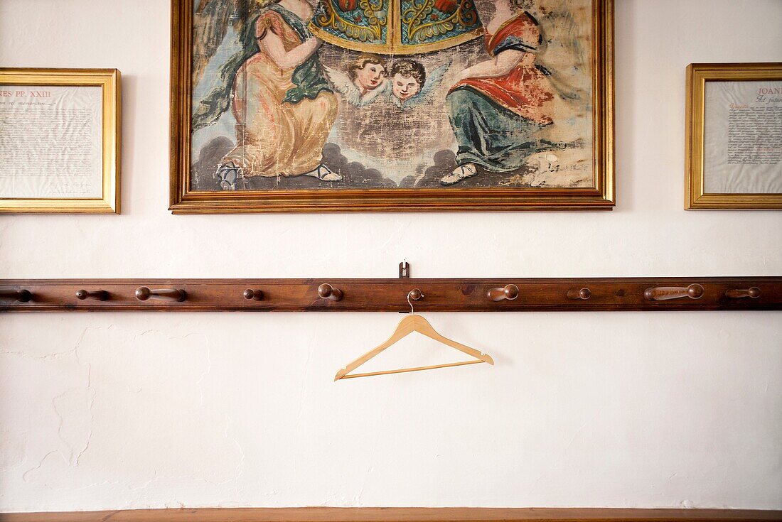Hangers and old painting. Mahon, Minorca, Balearic Islands, Spain