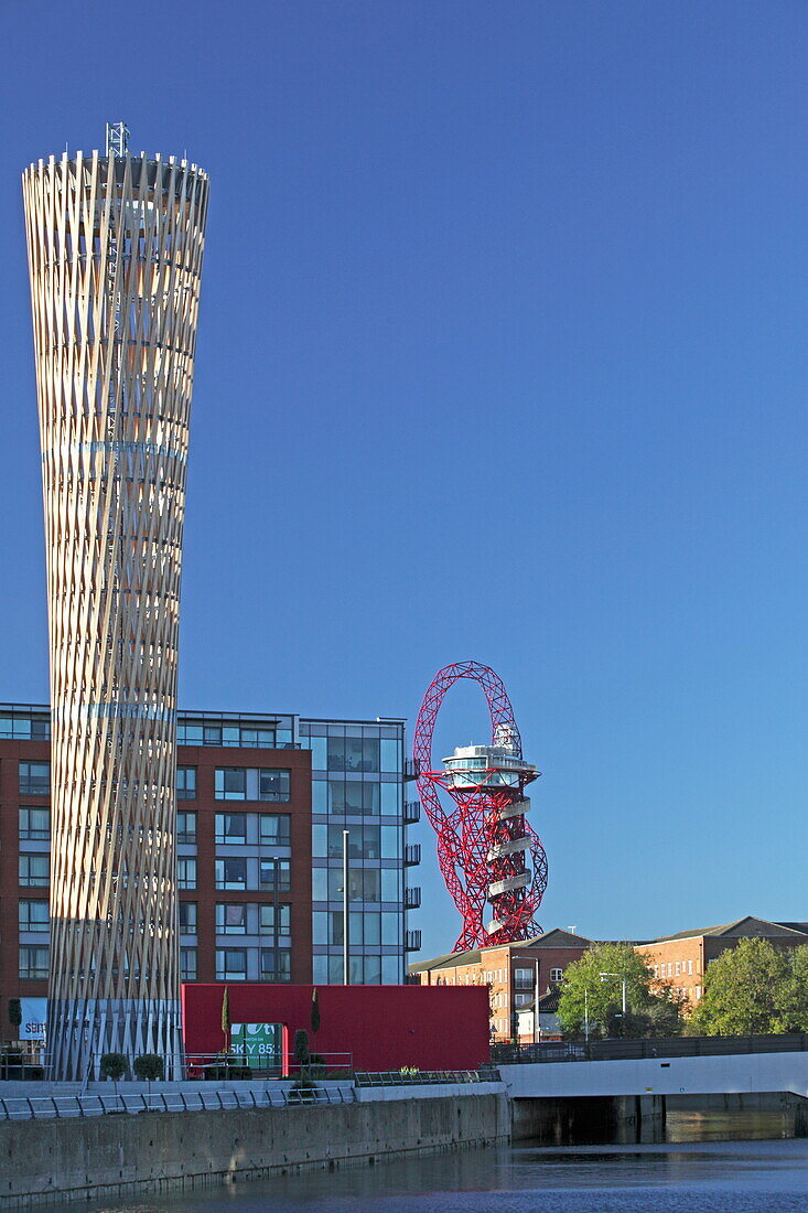 Strand East Tower at Danes Yard andArcelor Mittal Orbit, Queen Elizabeth Olympic Park, London, Great Britain