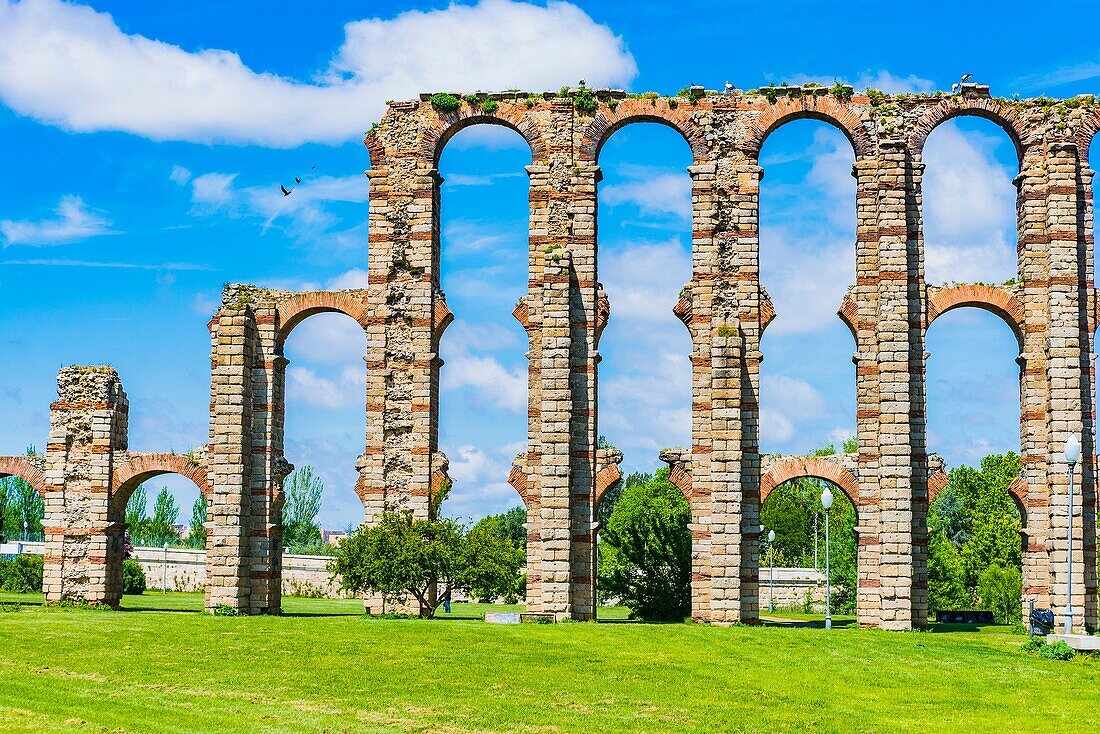 The Acueducto de los Milagros, Miraculous Aqueduct, is a ruined Roman aqueduct bridge, part of the aqueduct built to supply water to the Roman colony of Emerita Augusta, current Mérida, Badajoz, Extremadura, Spain, Europe.