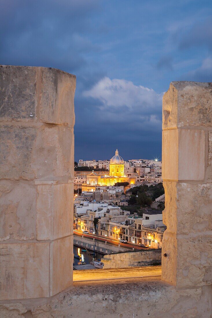 Looking through the battllements towards Kalkara, Malta.