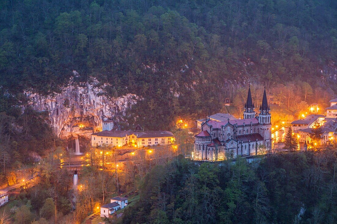 Night falls at Basilica de Covadonga, Asturias, Spain. Picos de Europa National Park.