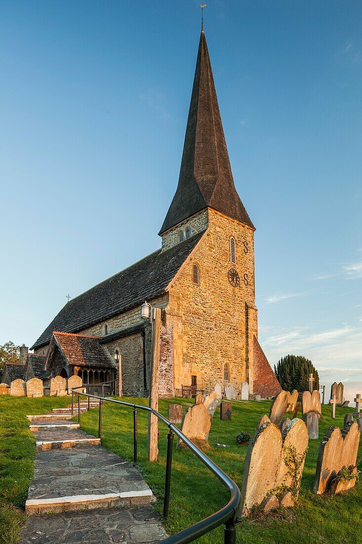 Sunset at St Michael ad Vincula church in Wisborough Green village, West Sussex, England.