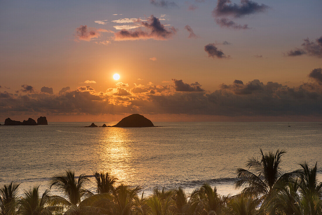 'Sunset over the islands in front of Ixtapa; Ixtapa, Mexico'