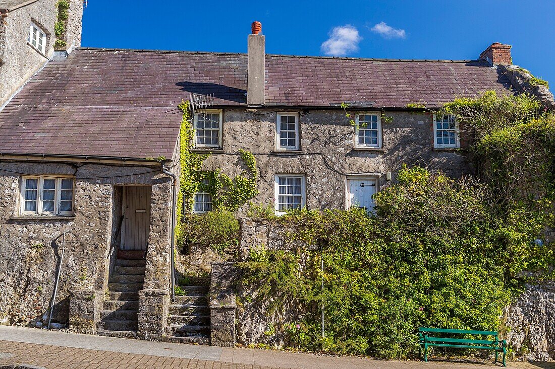 Old houses along Westgate Hill at Pembroke, Pembrokeshire, Wales, United Kingdom, Europe.