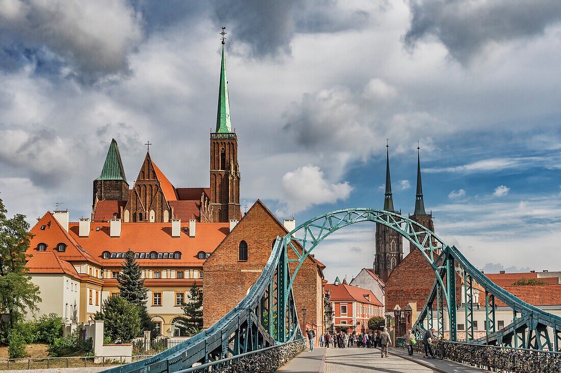 The Cathedral Bridge (most Tumski, also most Katedralny) connects the Sand Island (Wyspa Piasek) with the Cathedral Island (Ostrow Tumski). On the Cathedral Island are the Cross Church (left) and the Wroclaw Cathedral (right), Wroclaw, Lower Silesia Voivo